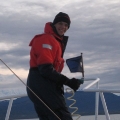 hosing down the muddy anchor
